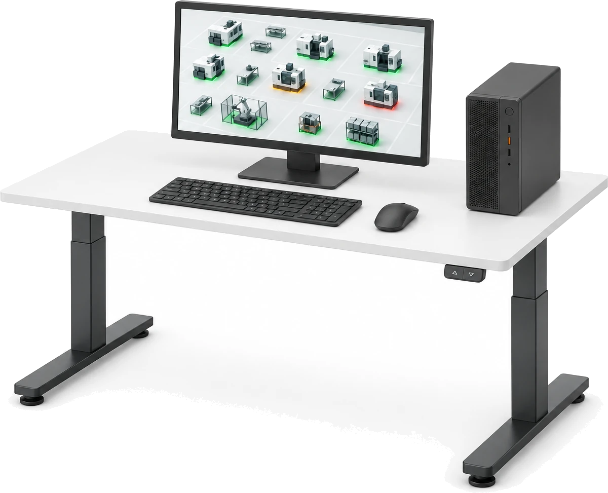 A desktop PC on a height-adjustable desk, its monitor showing the factory floor as a 3D model with each machine glowing green, amber or red for its live status.